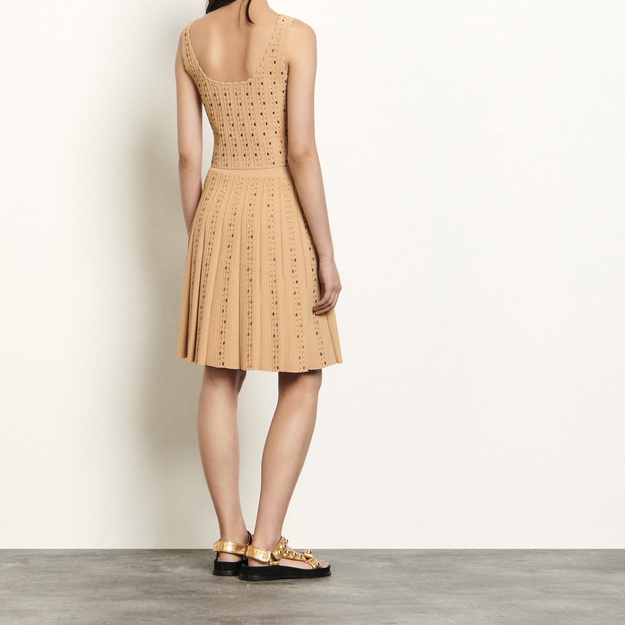 Jupe courte en Maille et perles Sandro seconde main