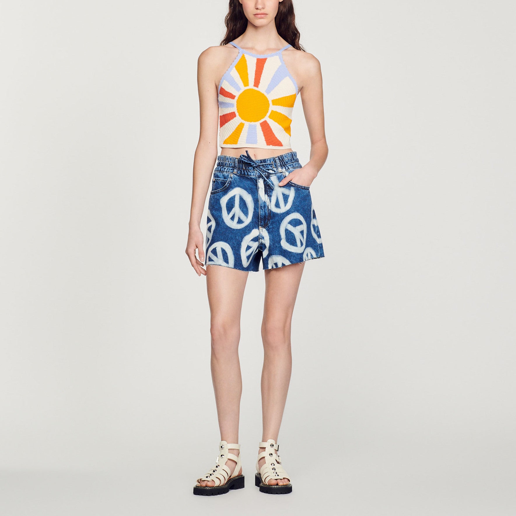 Short large en denim à motifs peace Sandro seconde main