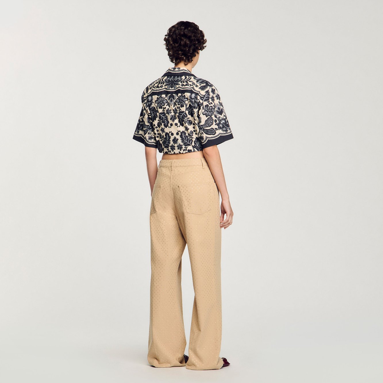 Jean large avec strass Sandro seconde main