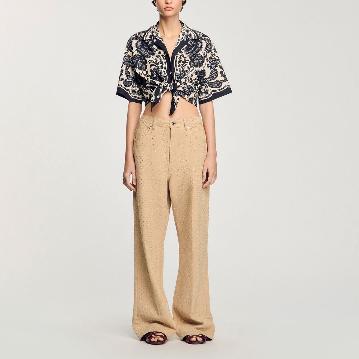 Jean large avec strass Sandro seconde main