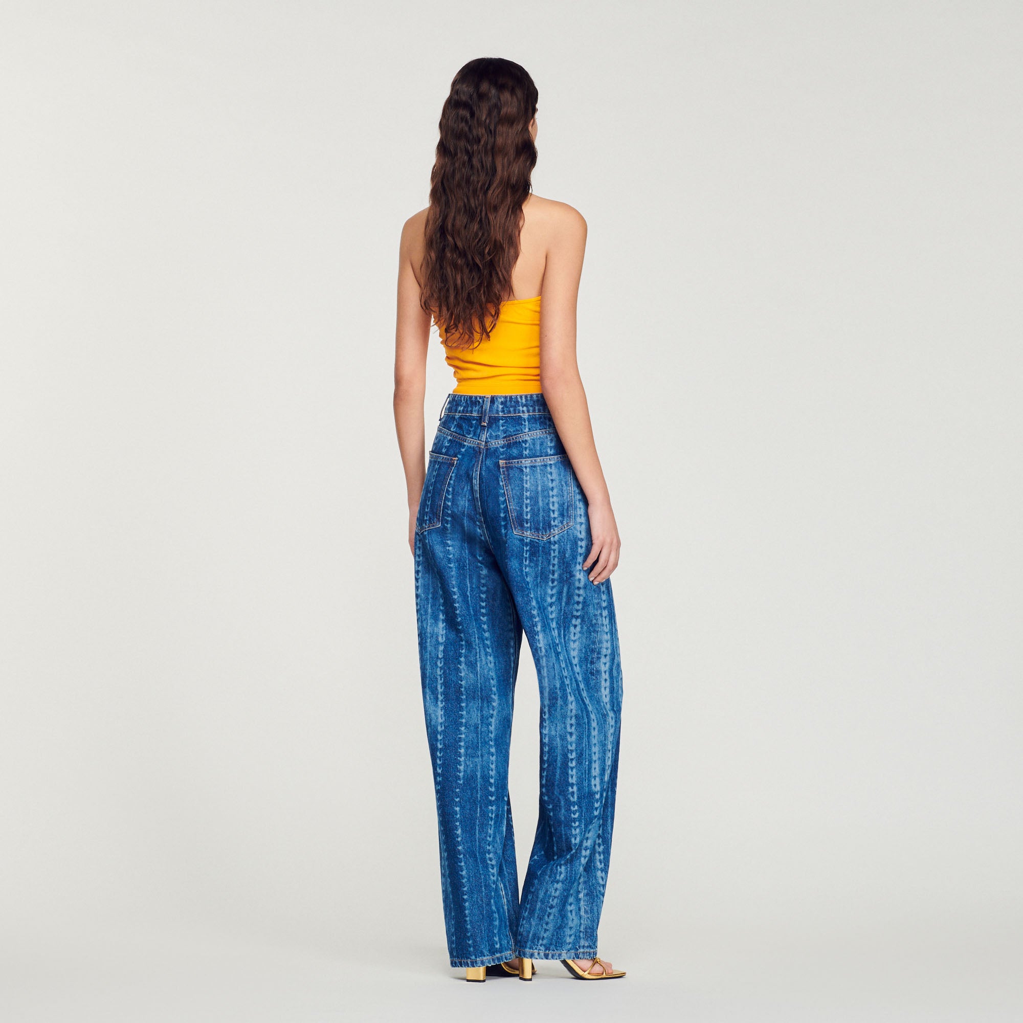 Jean à motifs délavés Sandro seconde main