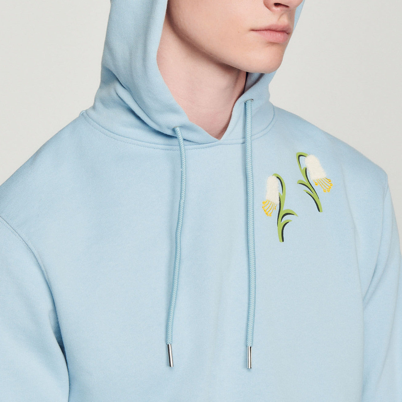 Hoodie à capuche et broderies muguets Sandro seconde main