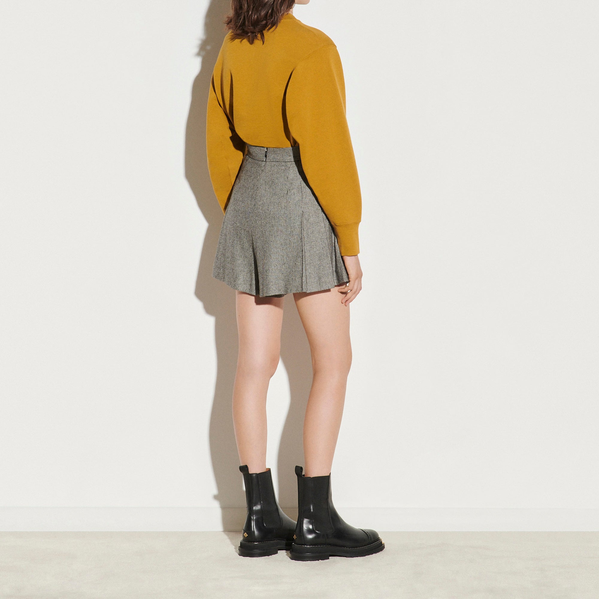 Short Jupe à motif pied de poule Sandro seconde main