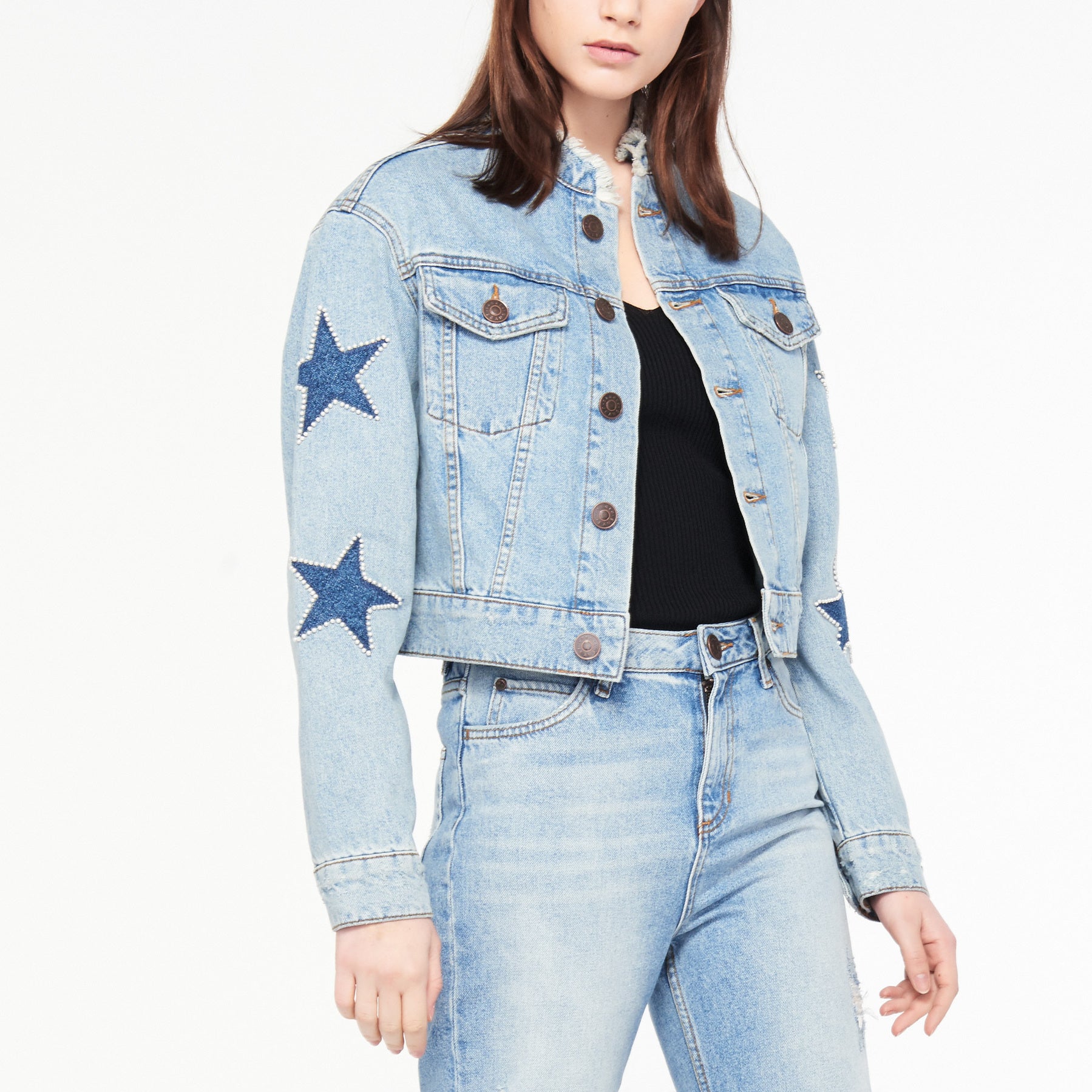 Veste courte en jeans à étoiles Sandro seconde main