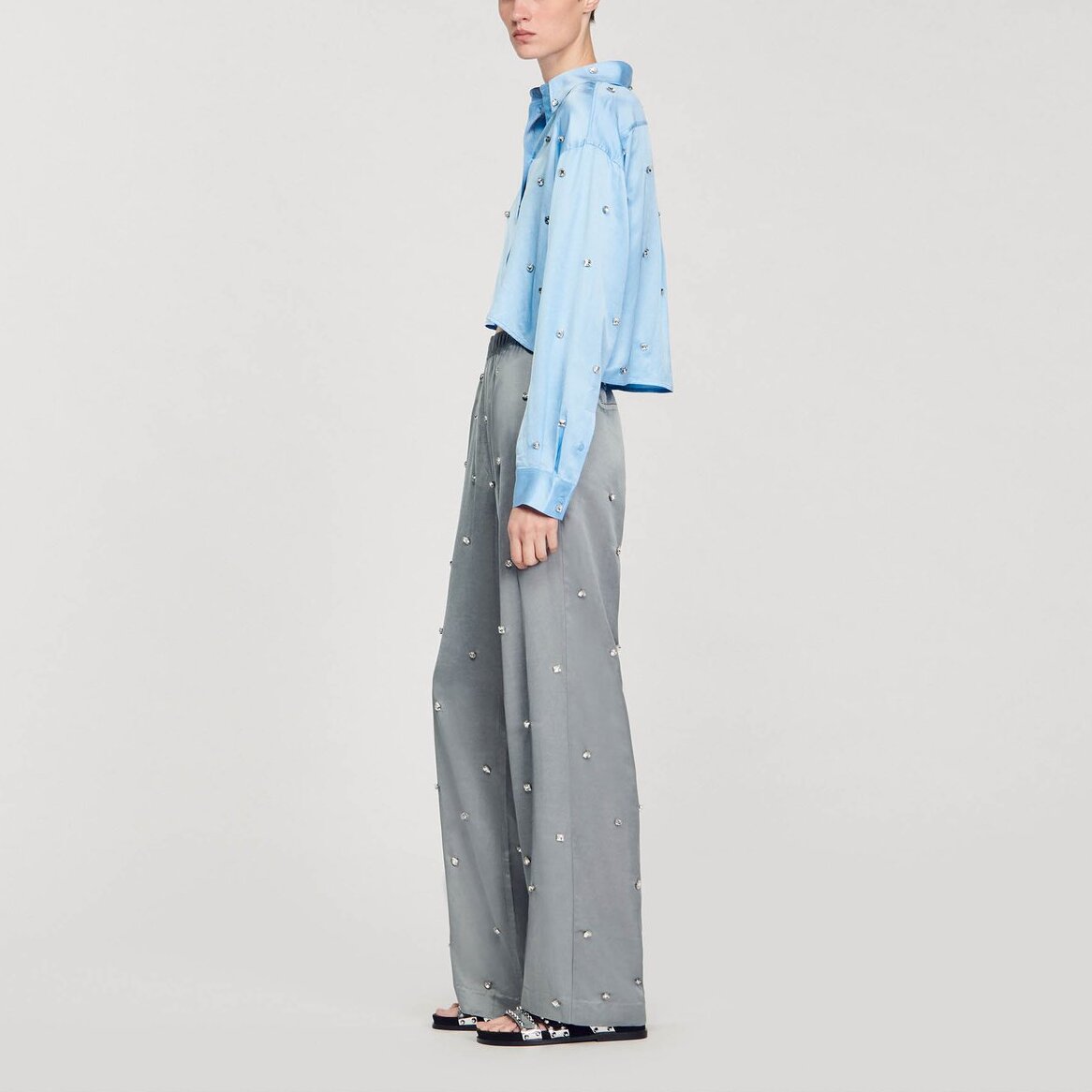 Pantalon en lin orné de strass Sandro seconde main