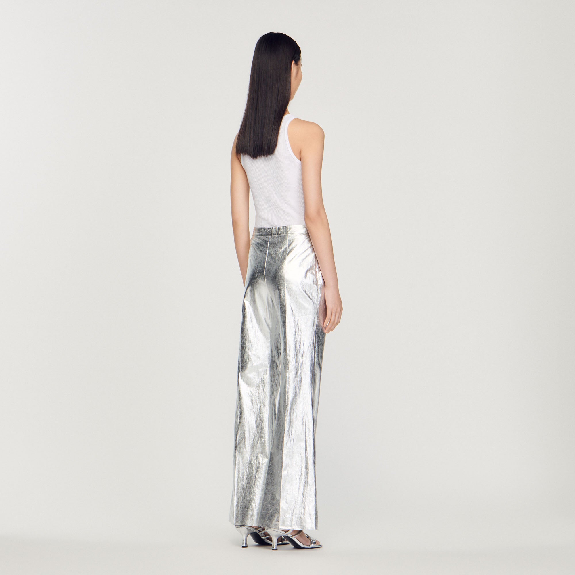 Pantalon enduit métallisé Sandro seconde main