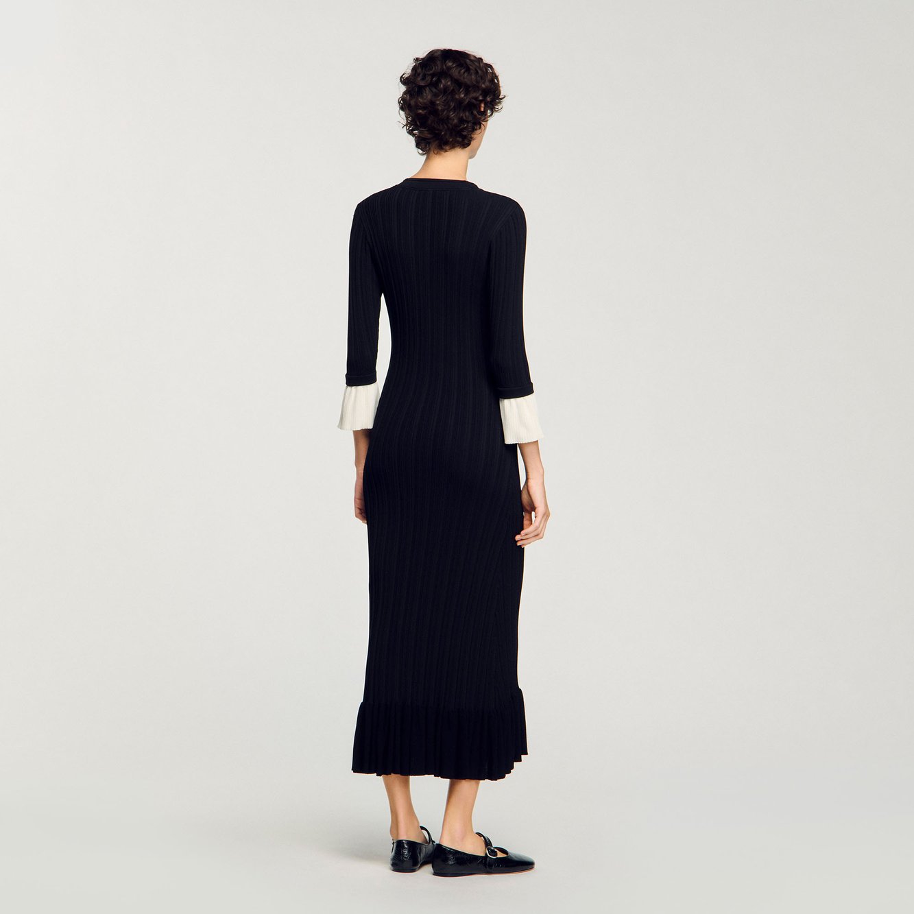 Robe longue en maille avec col V Sandro seconde main