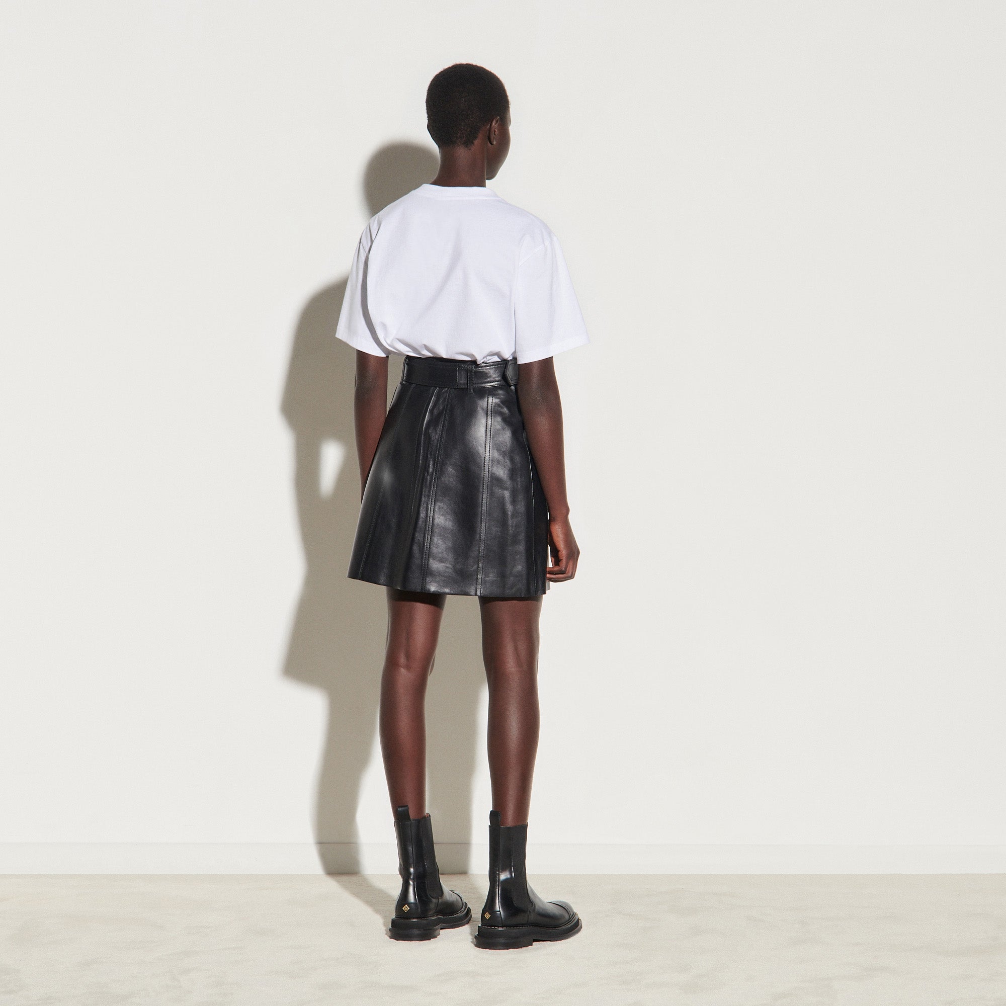 Jupe trapèze à découpes en cuir Sandro seconde main