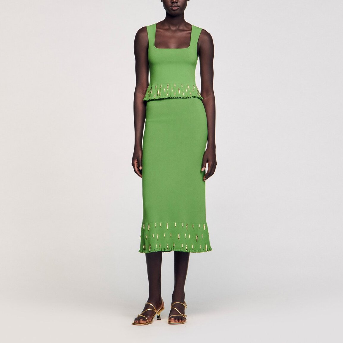 Jupe longue en maille à pampilles Sandro seconde main