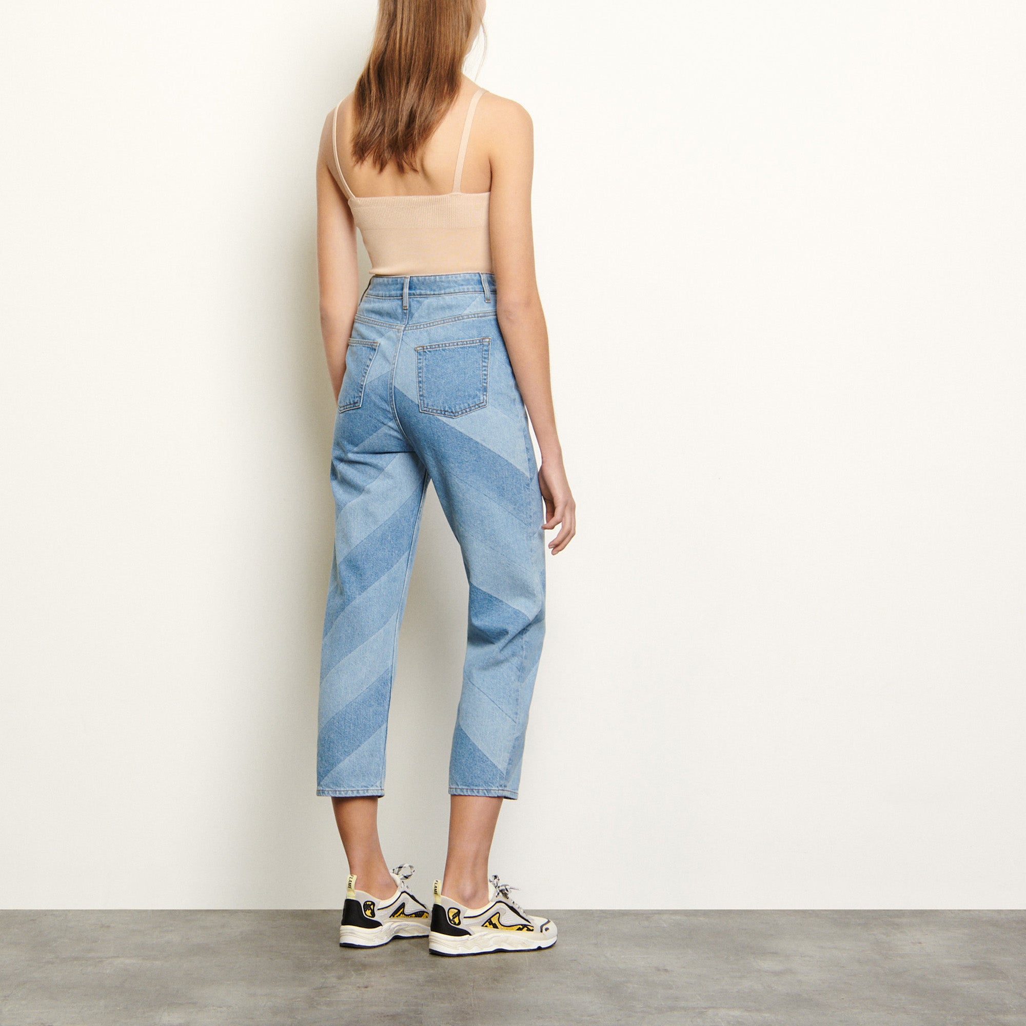 Jean à rayures diagonales Sandro seconde main