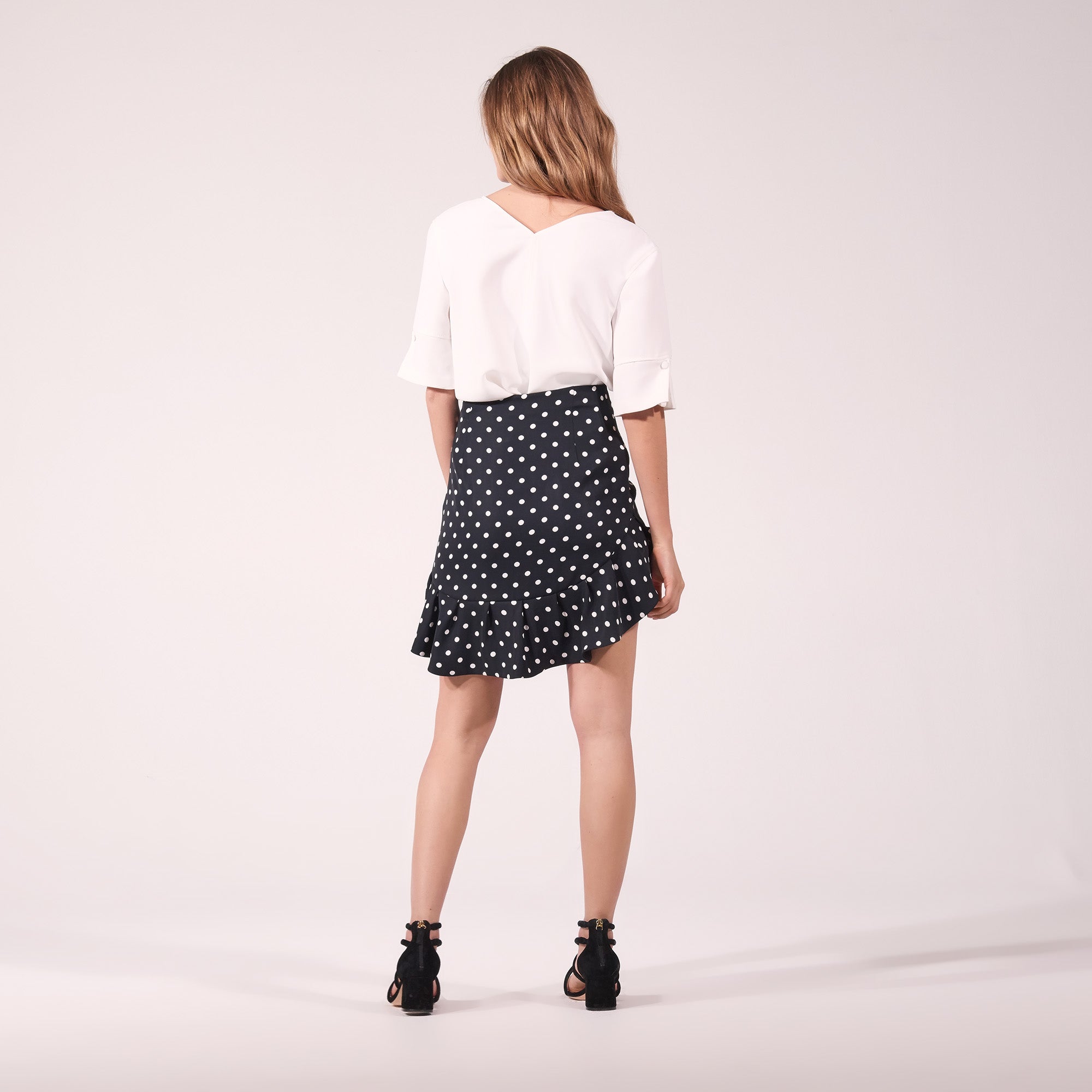 Jupe courte asymétrique à pois Sandro seconde main