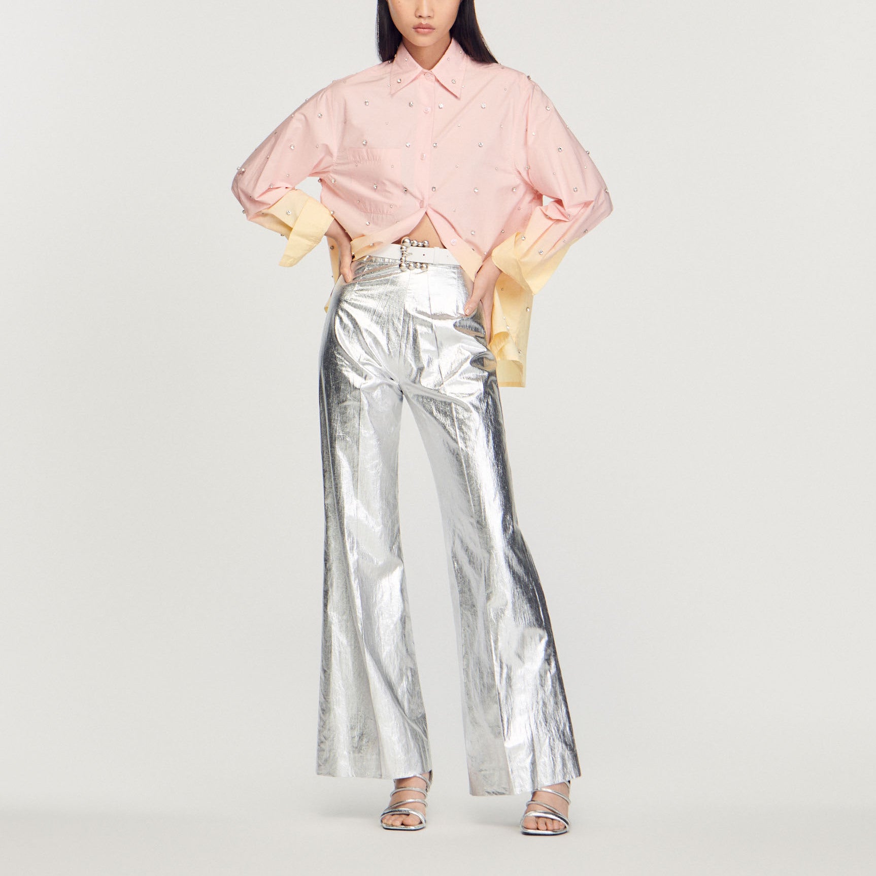 Pantalon enduit métallisé Sandro seconde main