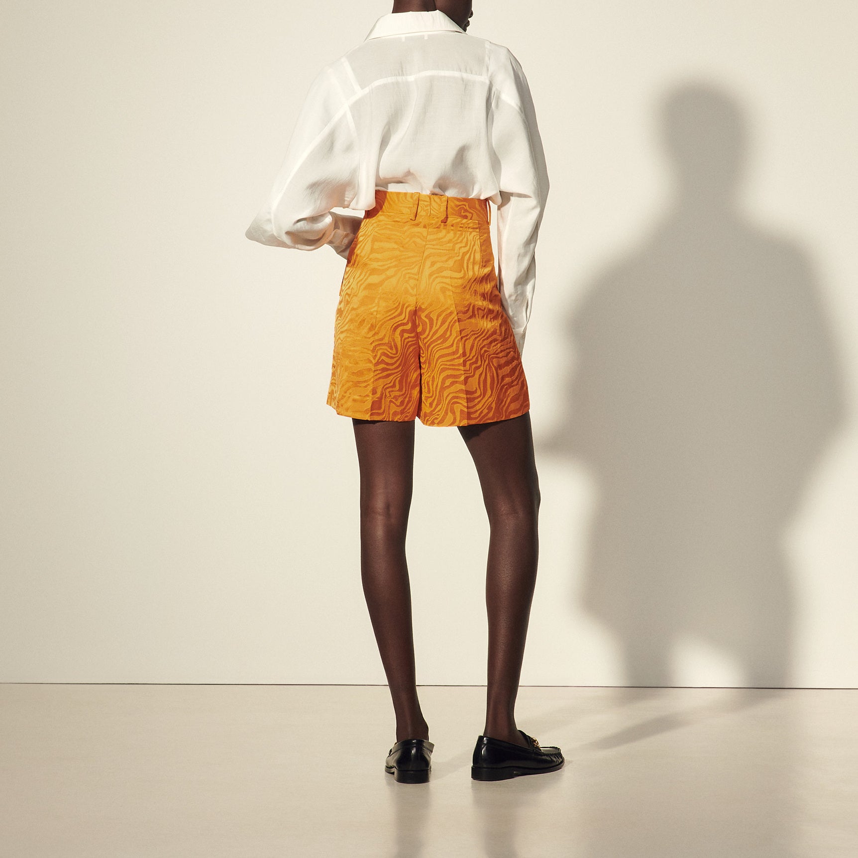 Short large au jacquard ton sur ton Sandro seconde main