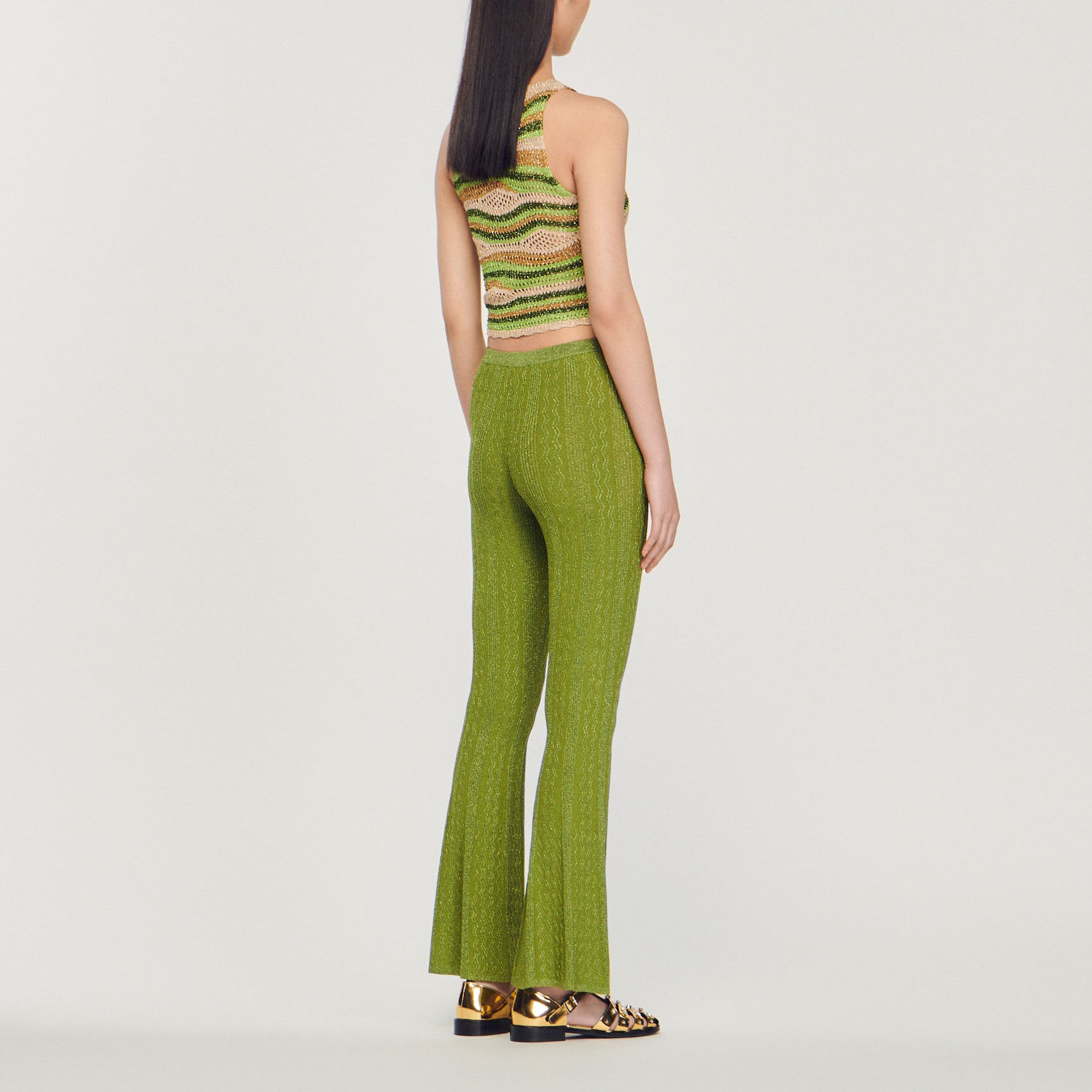 Pantalon en Maille métallisée Sandro seconde main