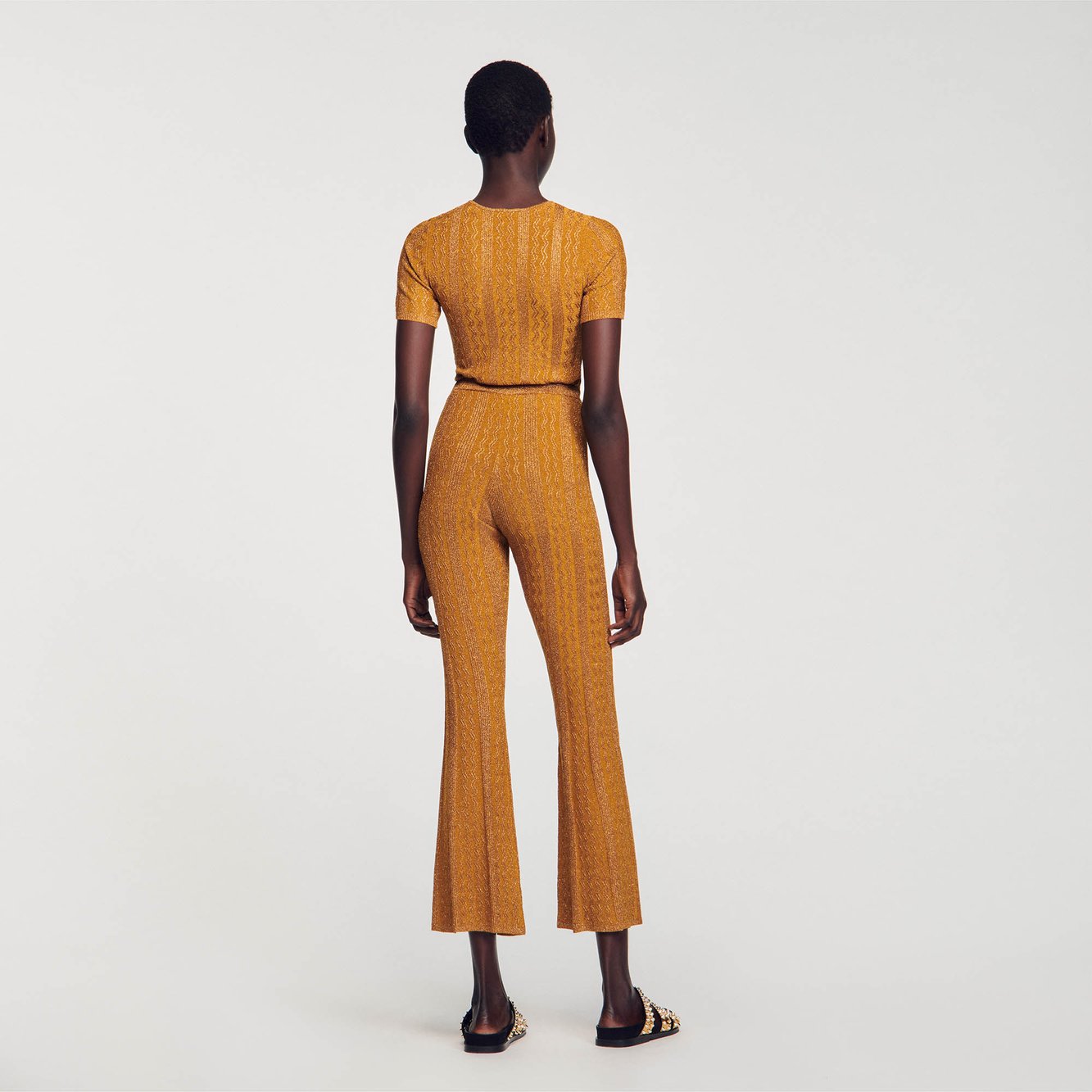 Pantalon en Maille métallisée Sandro seconde main