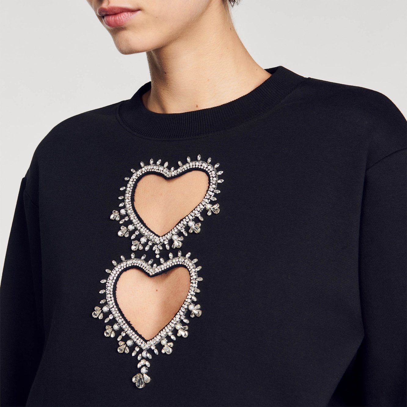 Sweatshirt à cœurs strassés Sandro seconde main