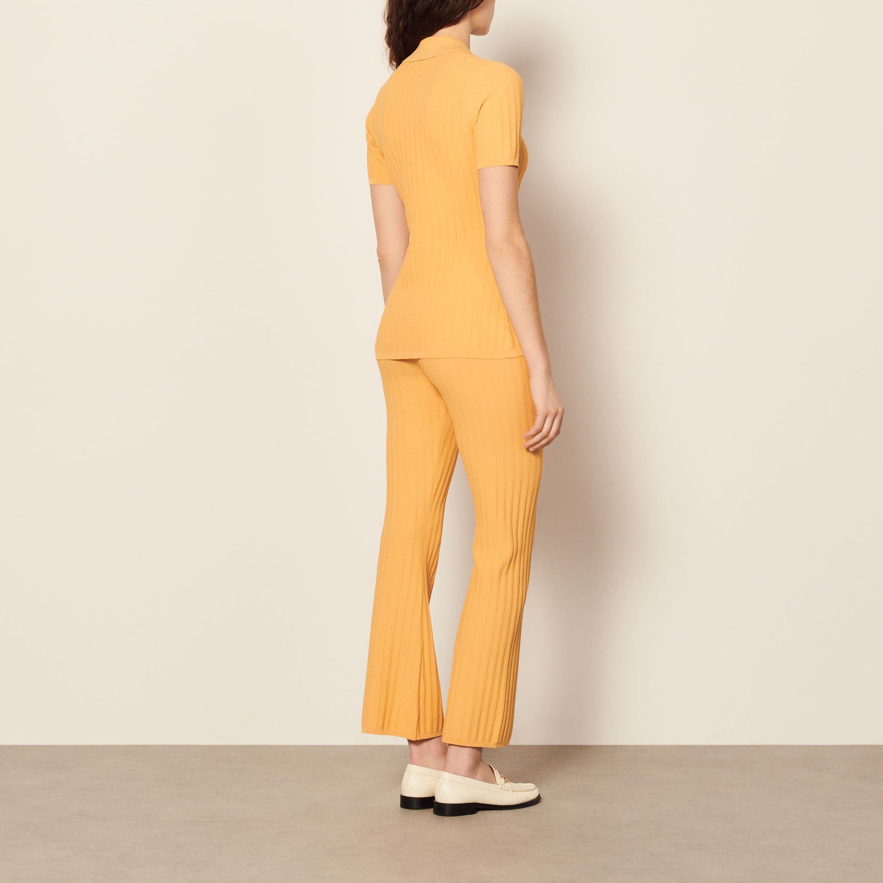 Top en Maille à boutons perles Sandro seconde main