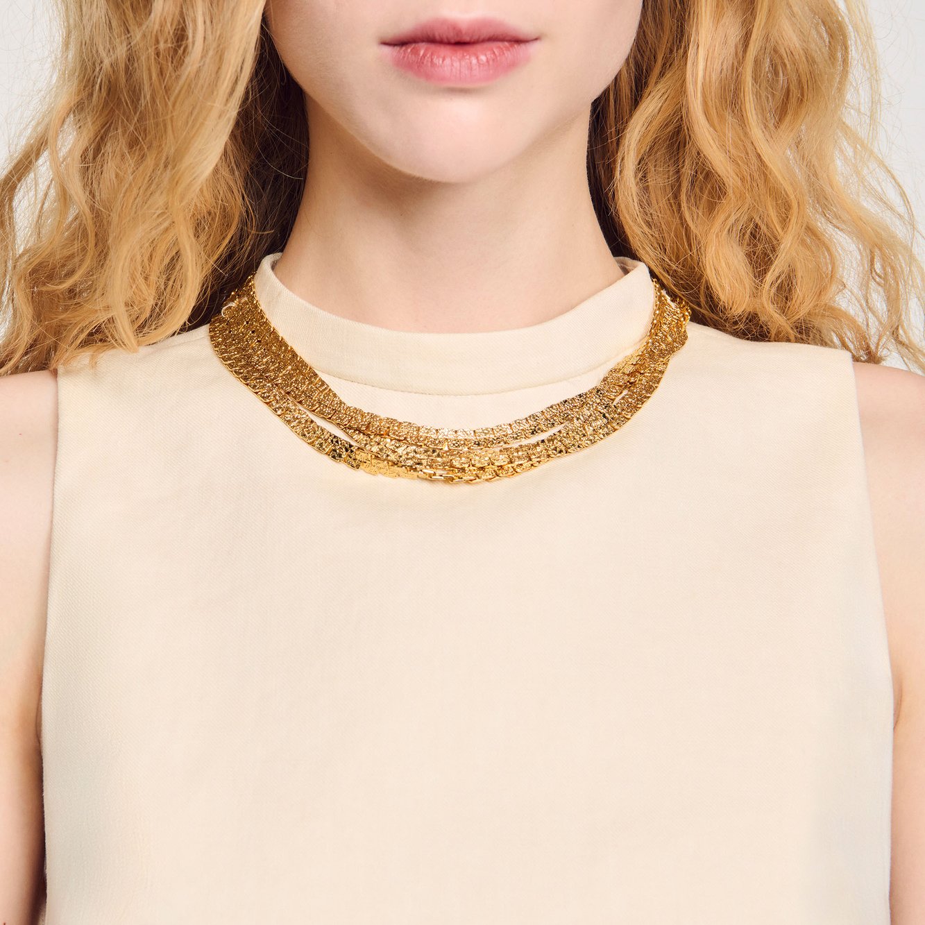 Top court en maille à collier Sandro seconde main