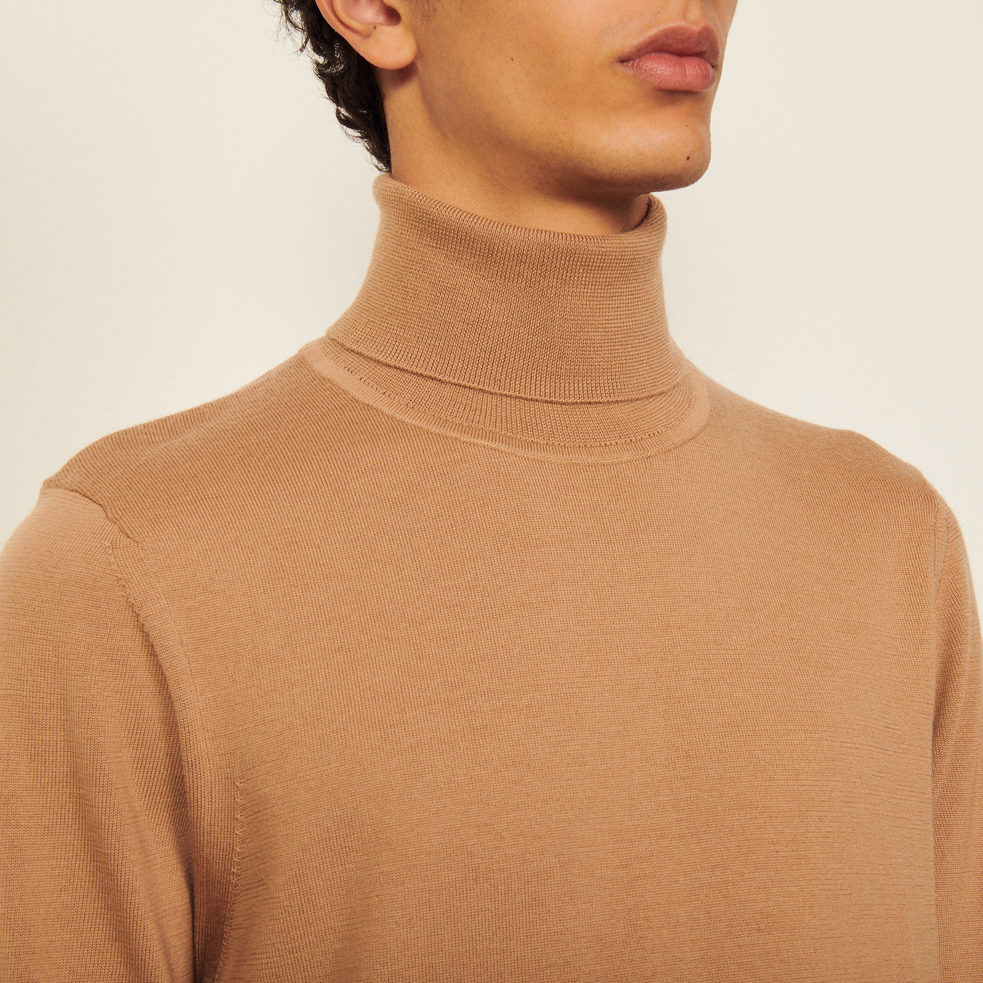 Pull à col roulé en laine Sandro seconde main