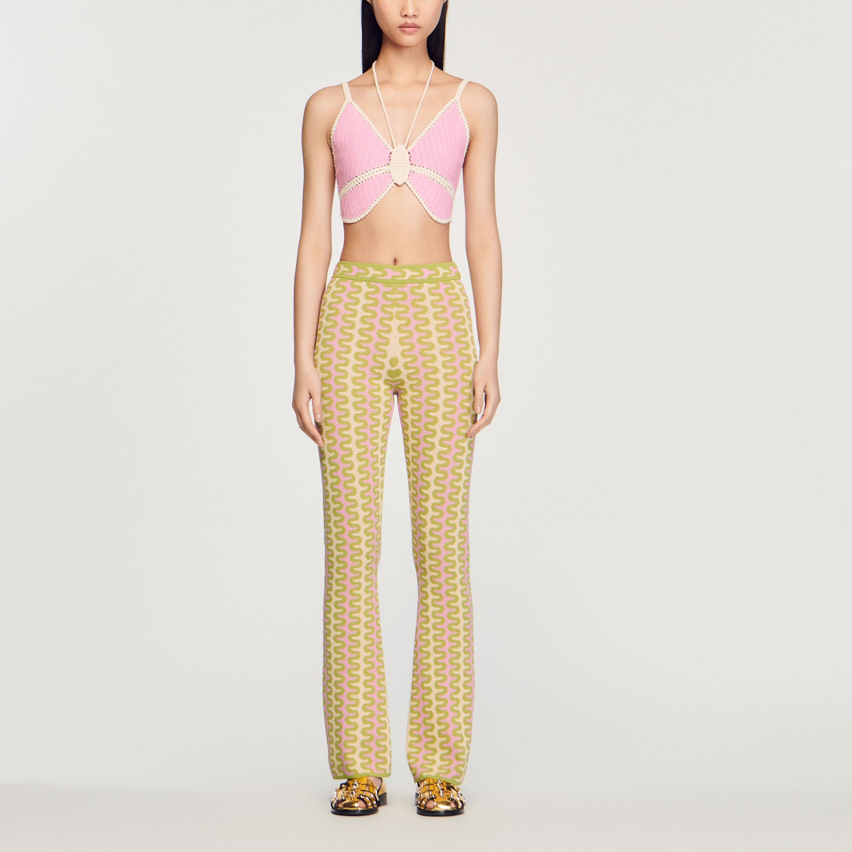 Pantalon en Maille à motifs Sandro seconde main