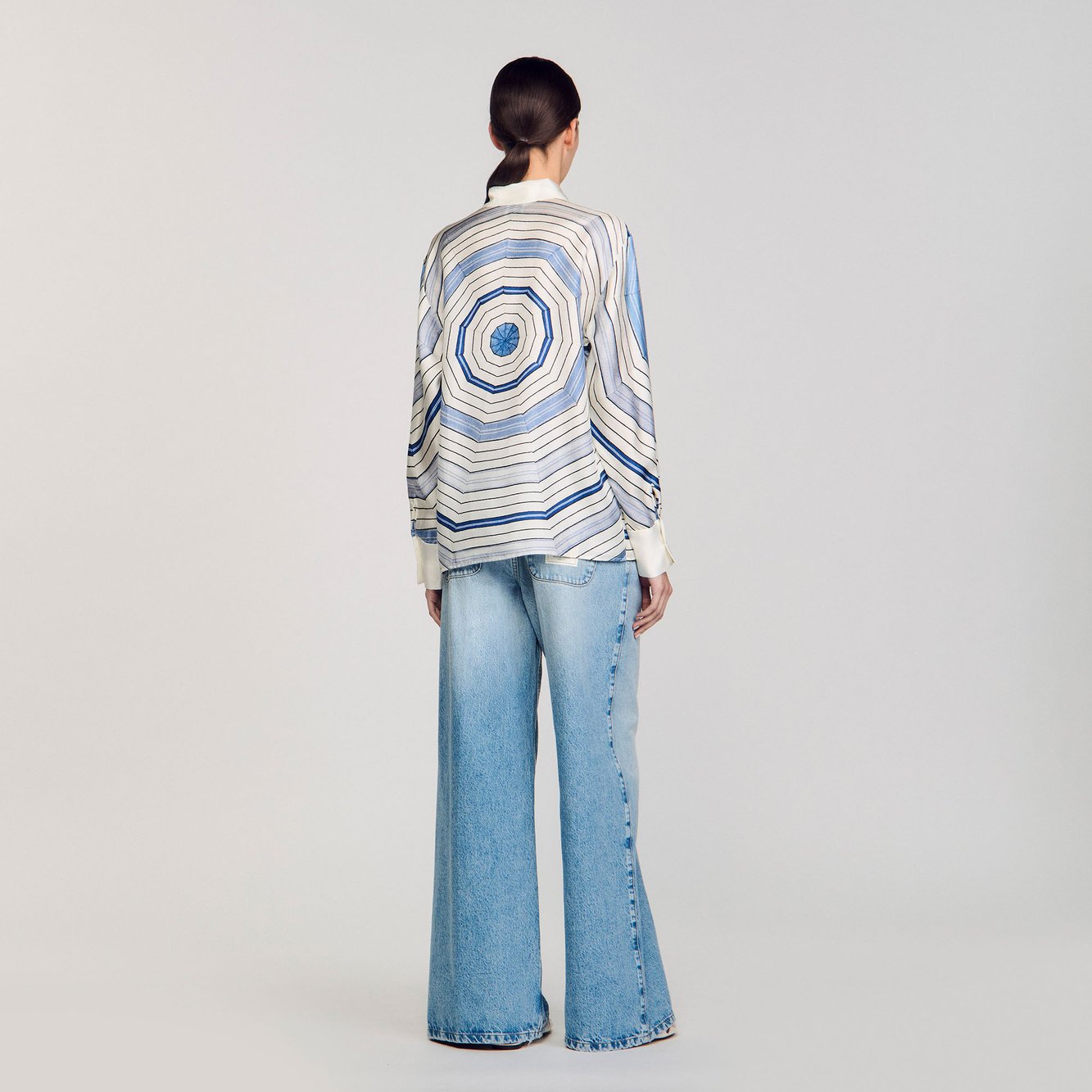 Chemise en soie à imprimé spirales Sandro seconde main