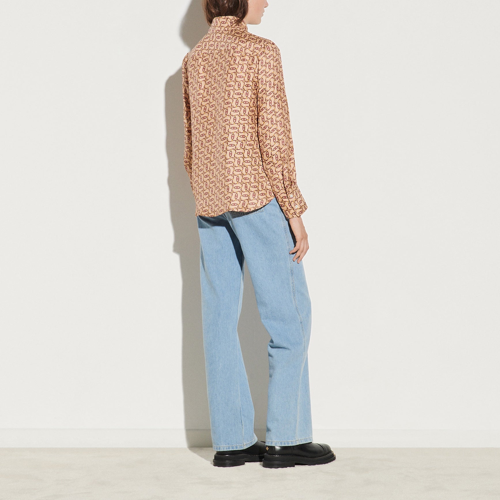 Chemise imprimée avec col cravate Sandro seconde main