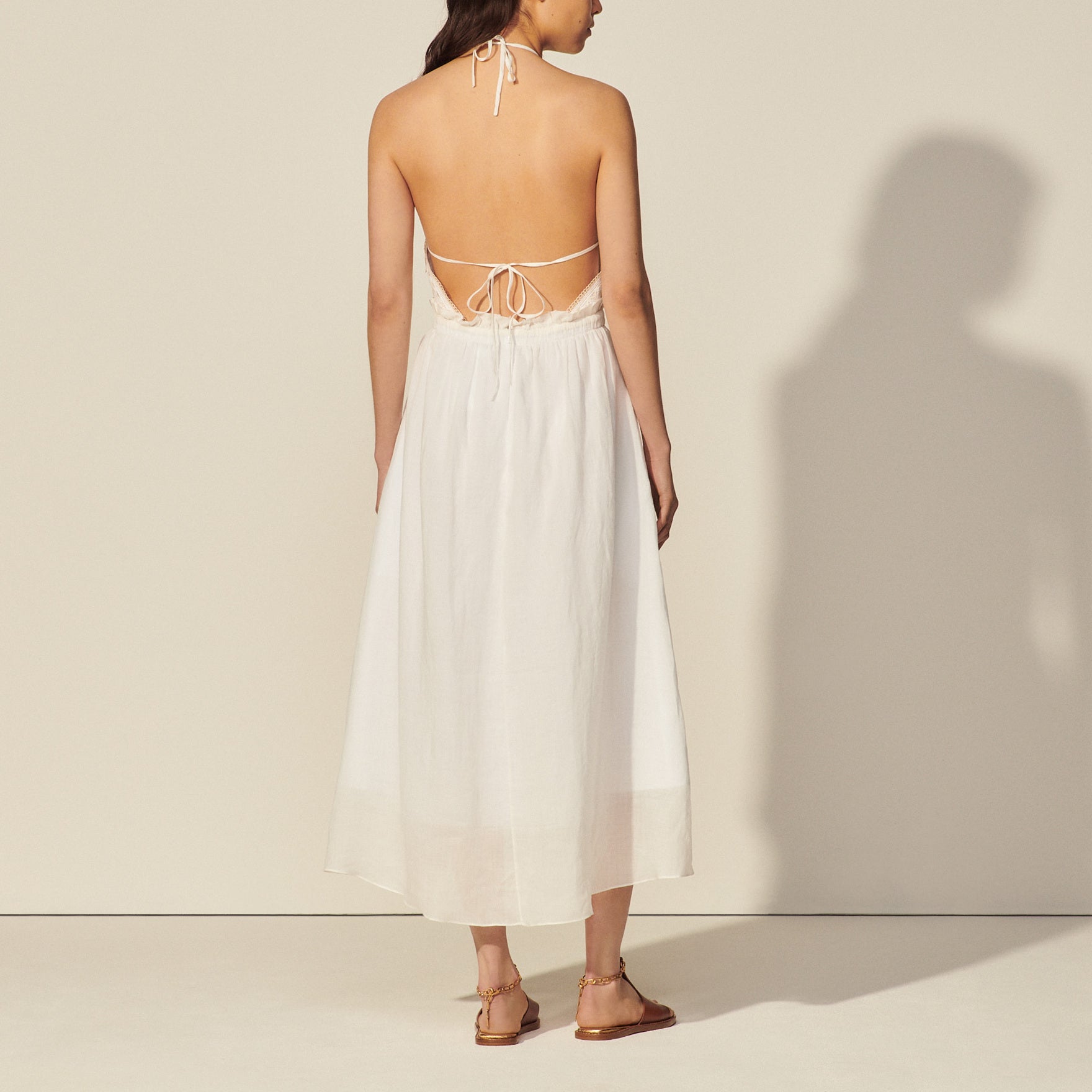 Robe longue dos nu et galon de dentelle Sandro seconde main