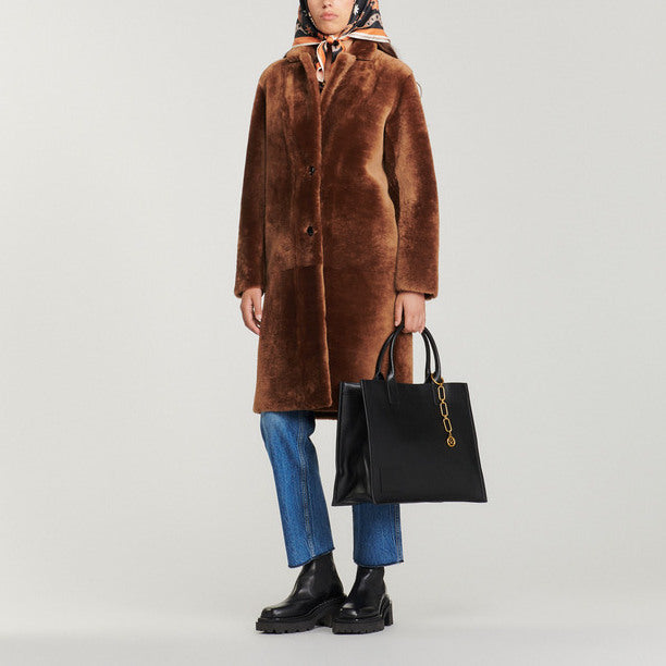 Manteau mi-long en peau lainée Sandro seconde main