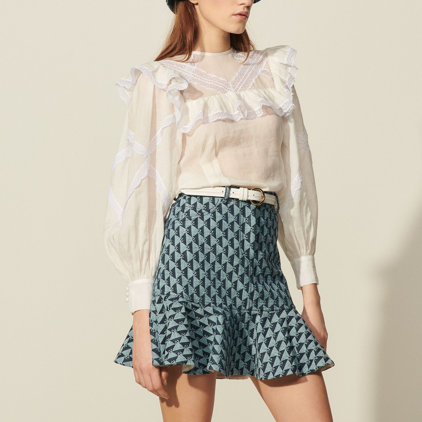 Jupe courte en monogramme denim Sandro seconde main