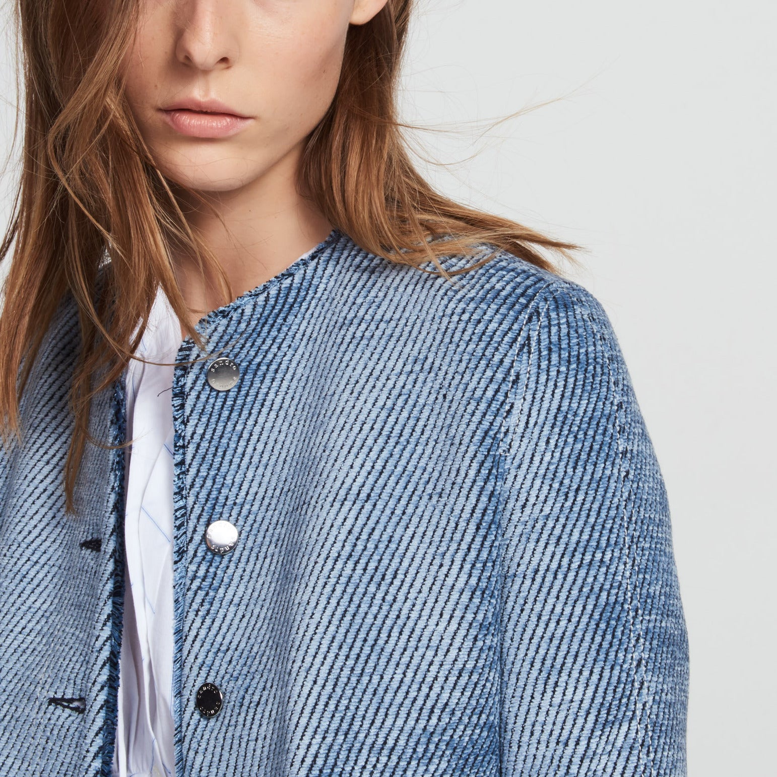 Veste en matière texturée et zips Sandro seconde main