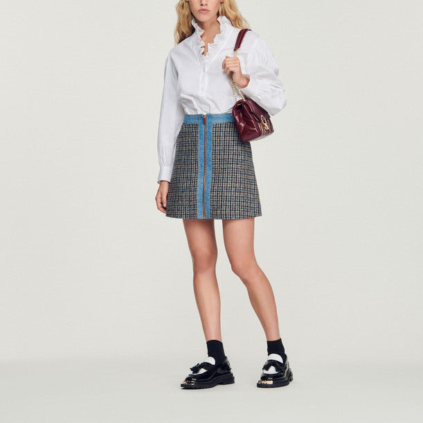 Jupe courte en tweed et Jean Sandro seconde main