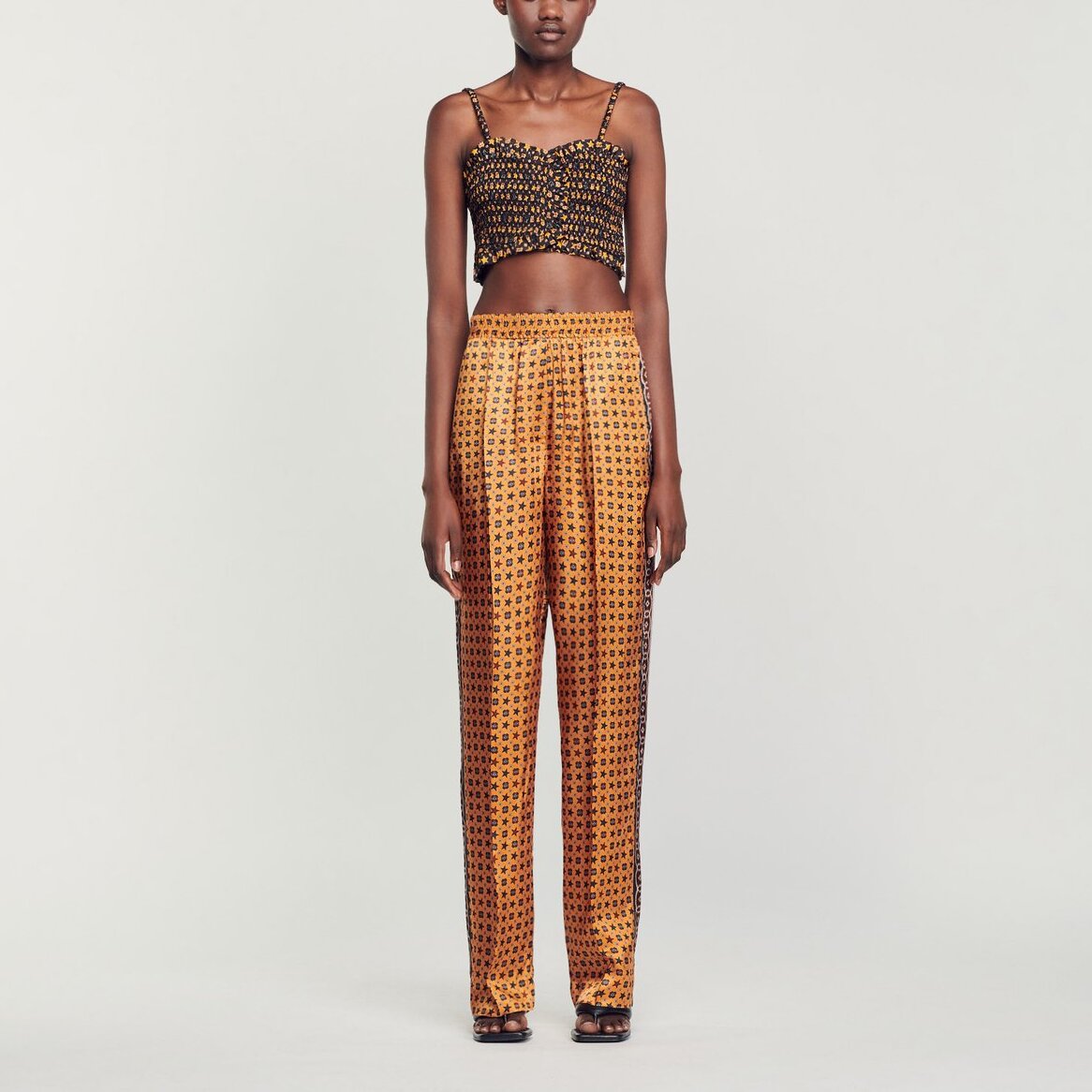 Pantalon satiné imprimé Sandro seconde main