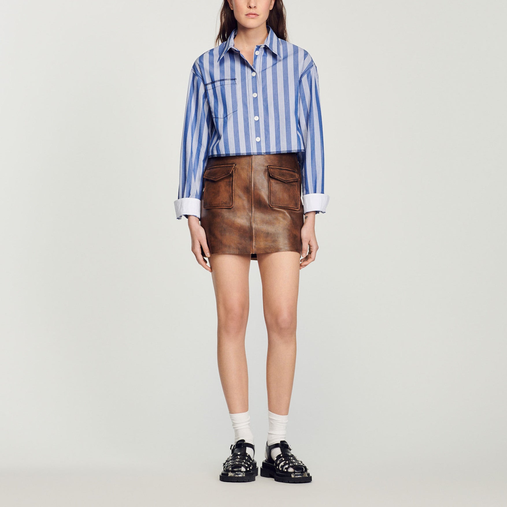 Jupe courte en cuir vieilli Sandro seconde main