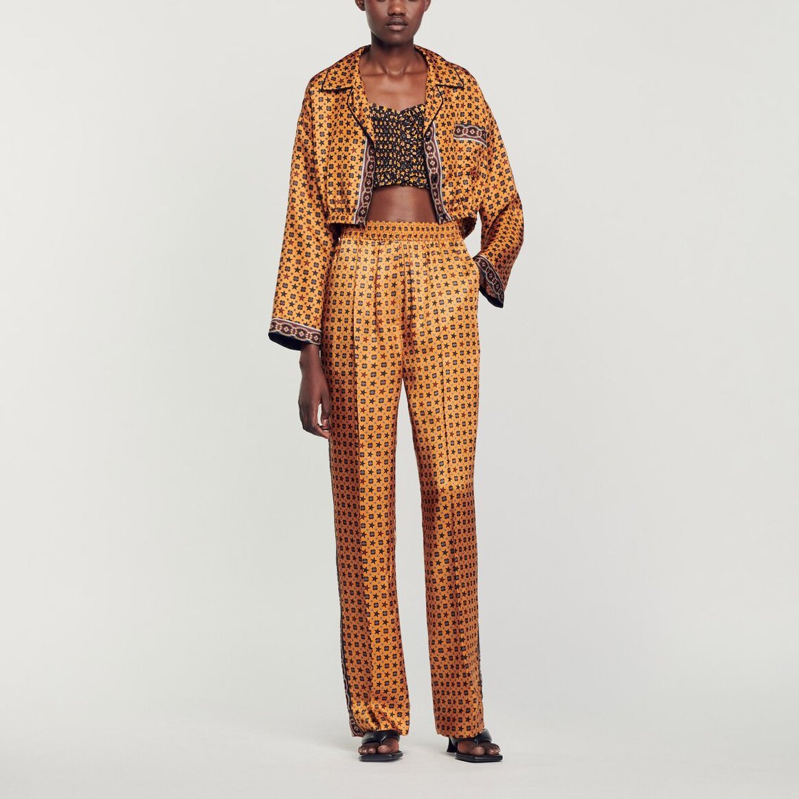 Pantalon satiné imprimé Sandro seconde main