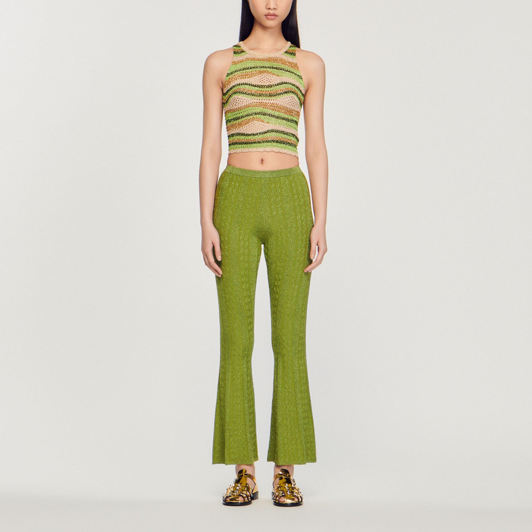 Pantalon en Maille métallisée Sandro seconde main