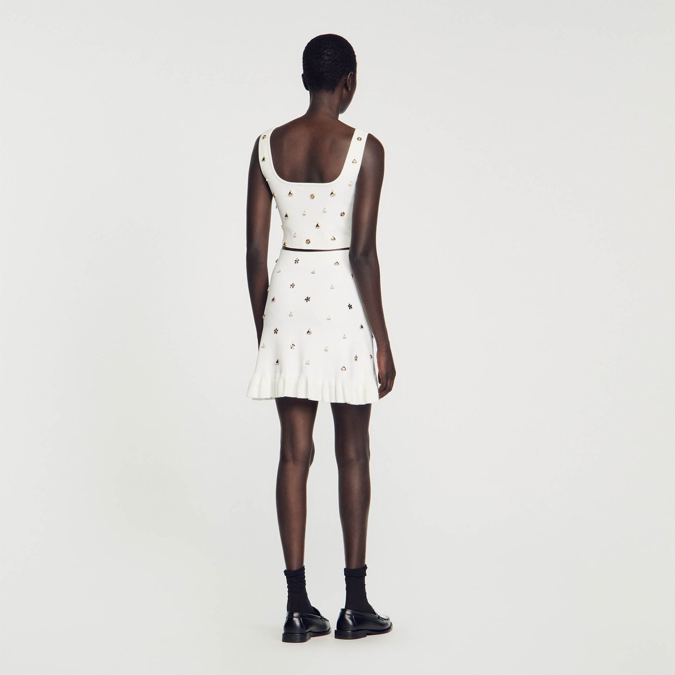 Jupe en Maille ornée de charms Sandro seconde main