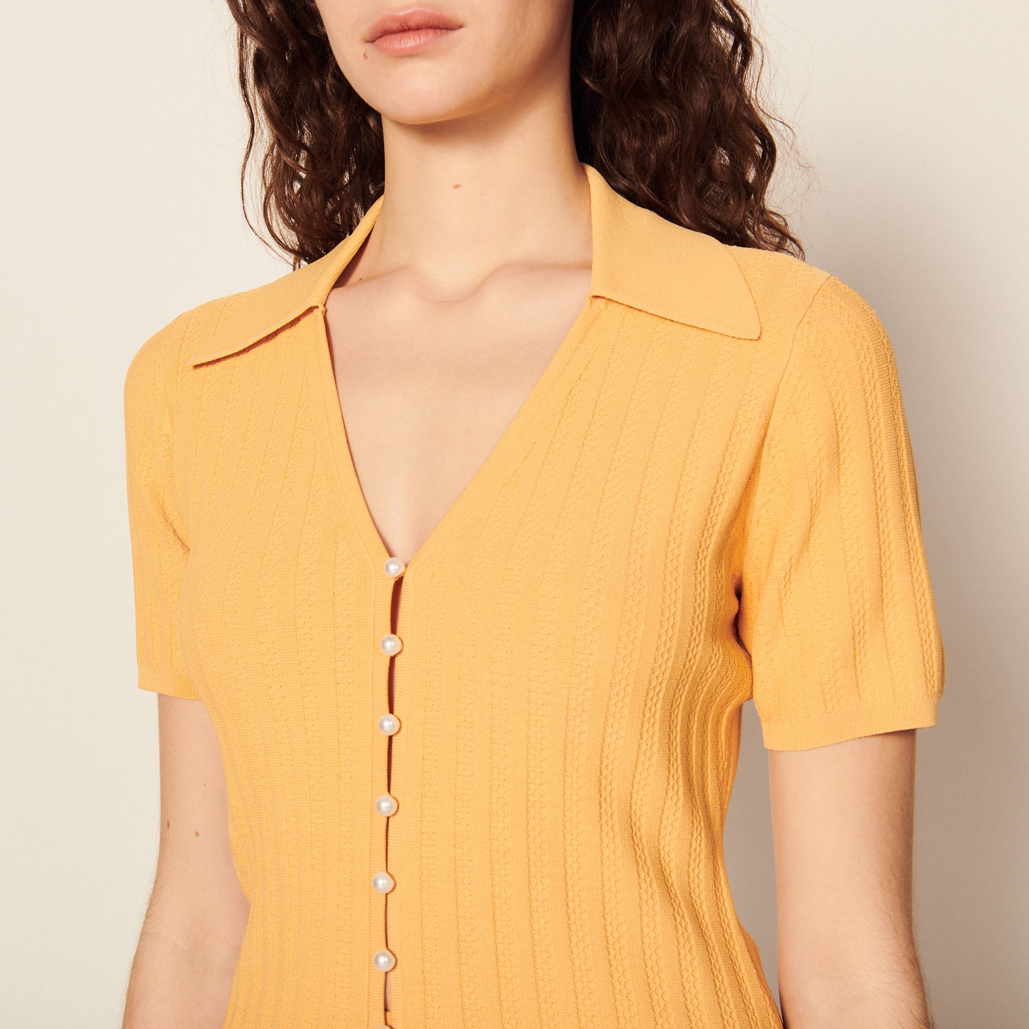 Top en Maille à boutons perles Sandro seconde main