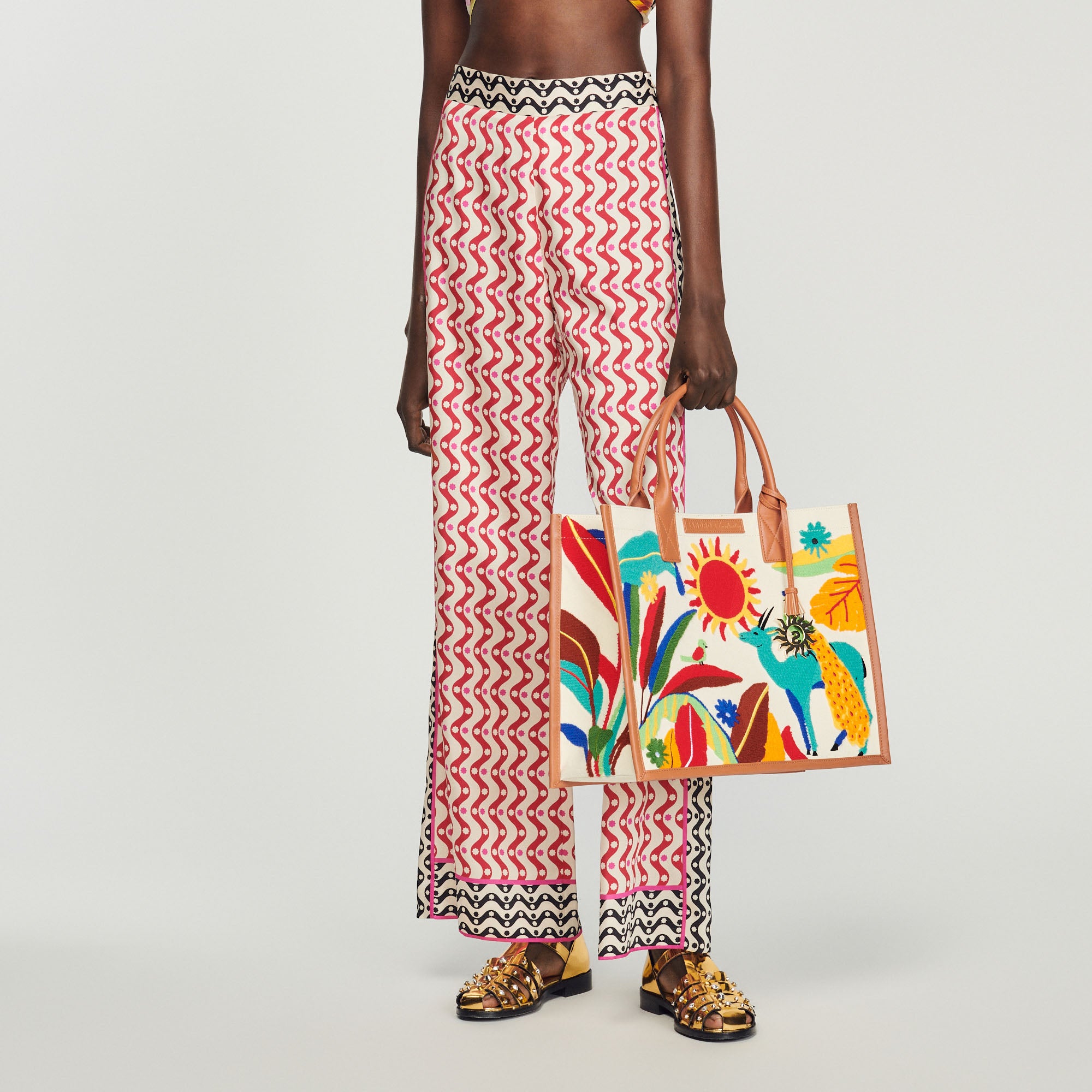 Pantalon fluide imprimé étoiles Sandro seconde main