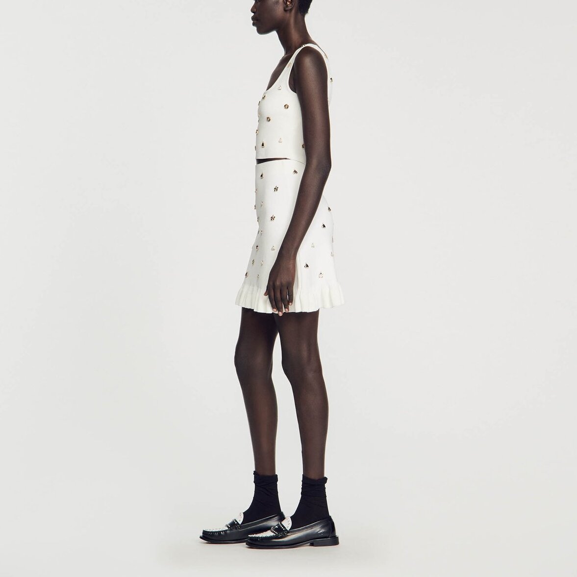 Jupe en Maille ornée de charms Sandro seconde main