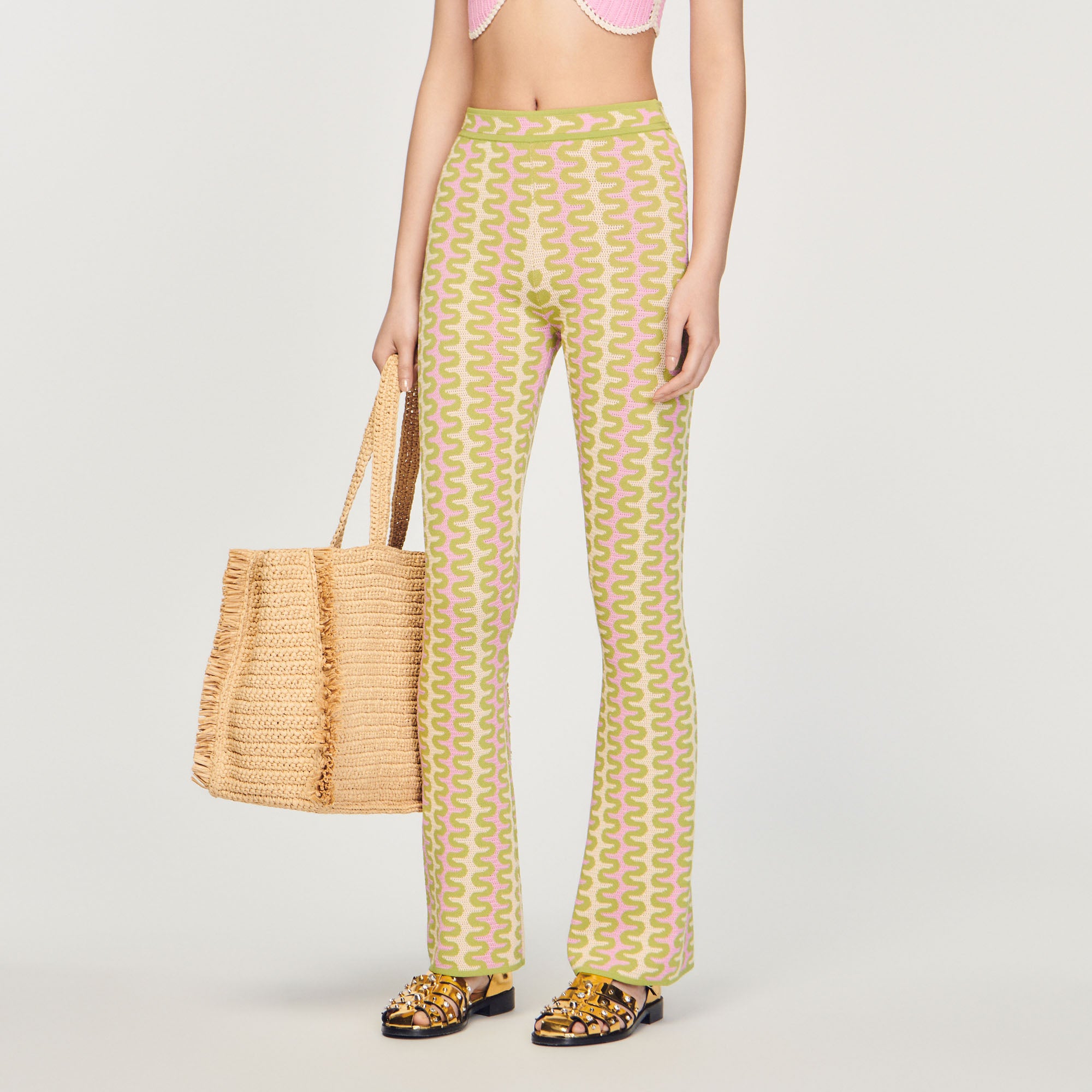 Pantalon en Maille à motifs Sandro seconde main