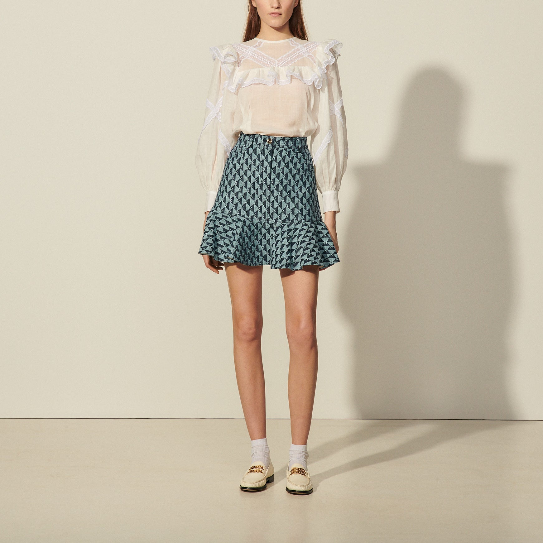 Jupe courte en monogramme denim Sandro seconde main