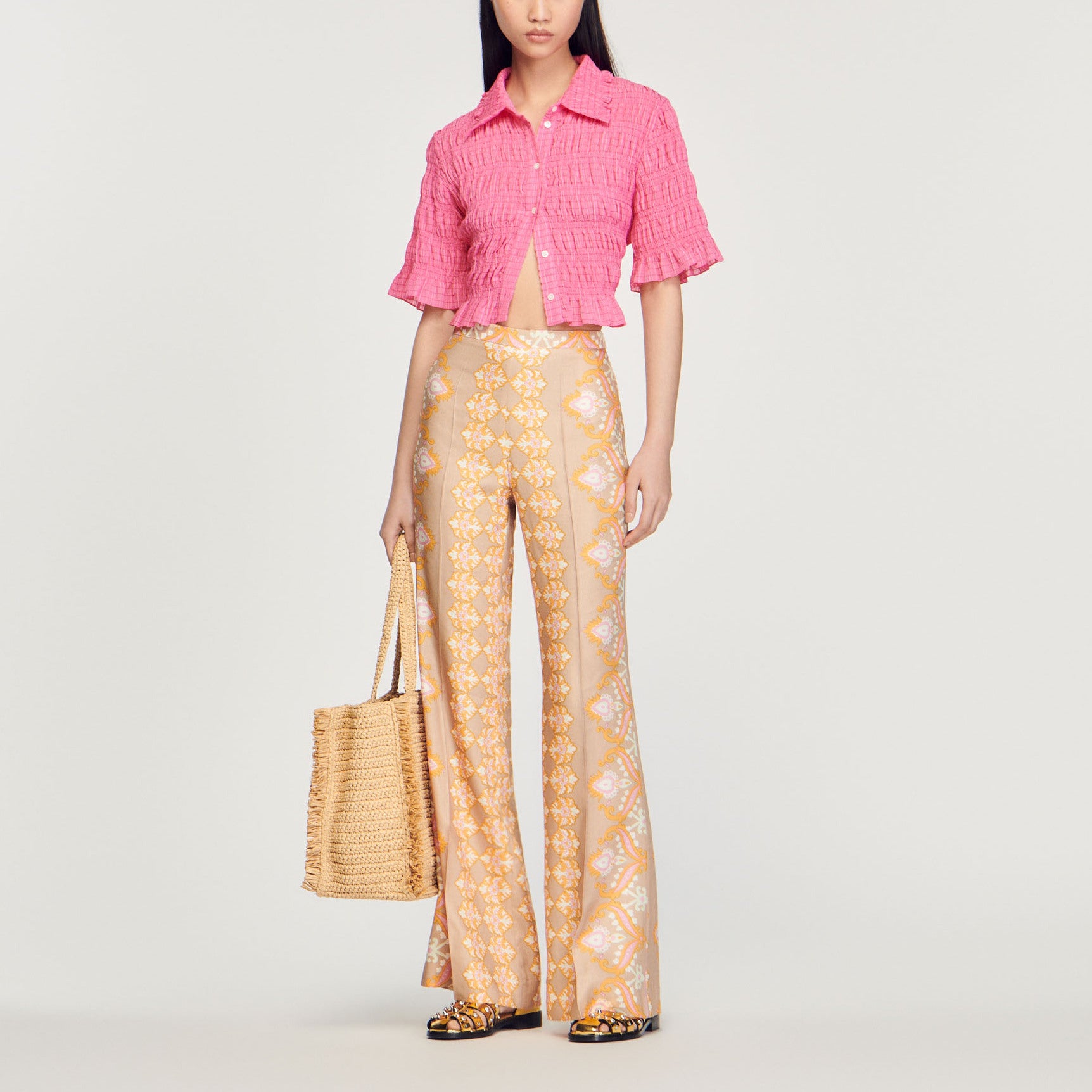 Pantalon fluide imprimé Sandro seconde main