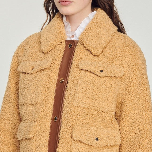 Manteau en fausse fourrure Sandro seconde main