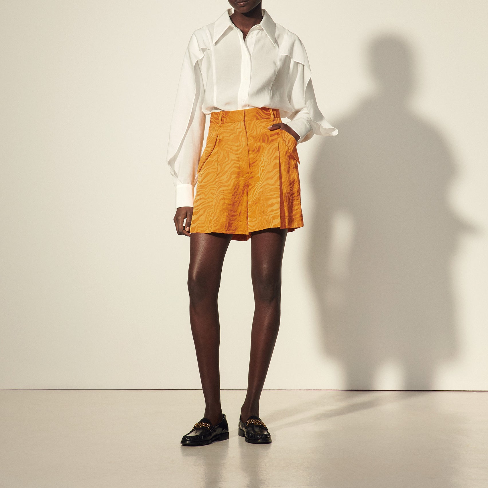 Short large au jacquard ton sur ton Sandro seconde main