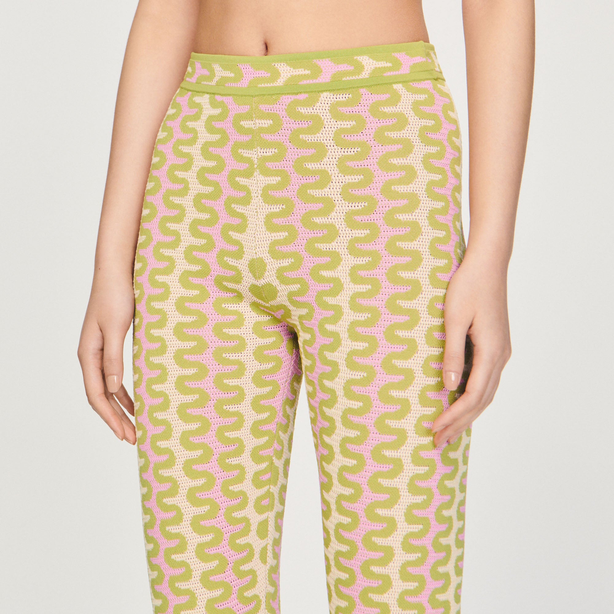 Pantalon en Maille à motifs Sandro seconde main