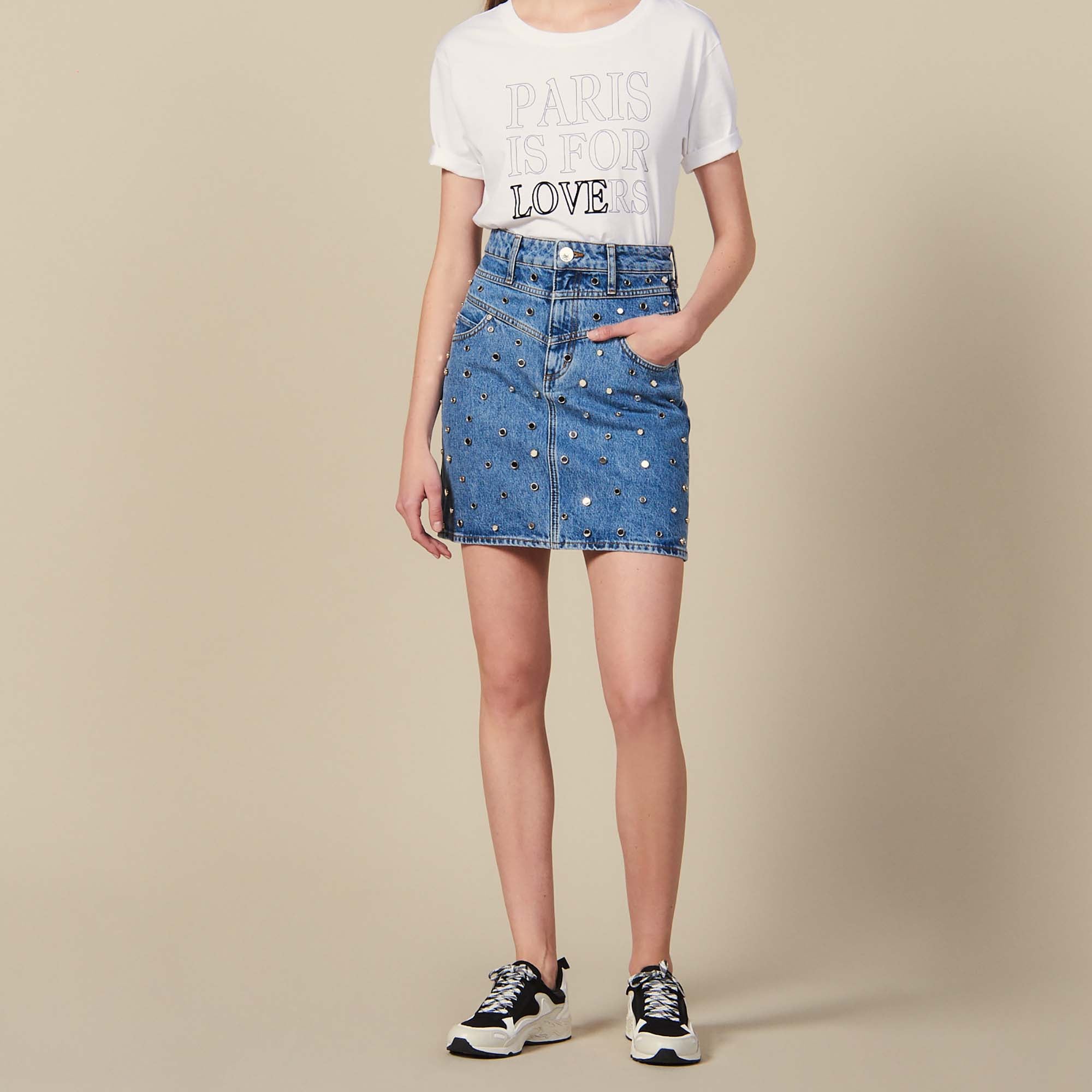 Jupe courte en Jean ornée de studs Sandro seconde main