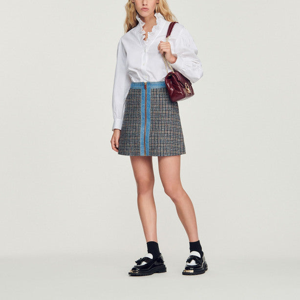 Jupe courte en tweed et Jean Sandro seconde main