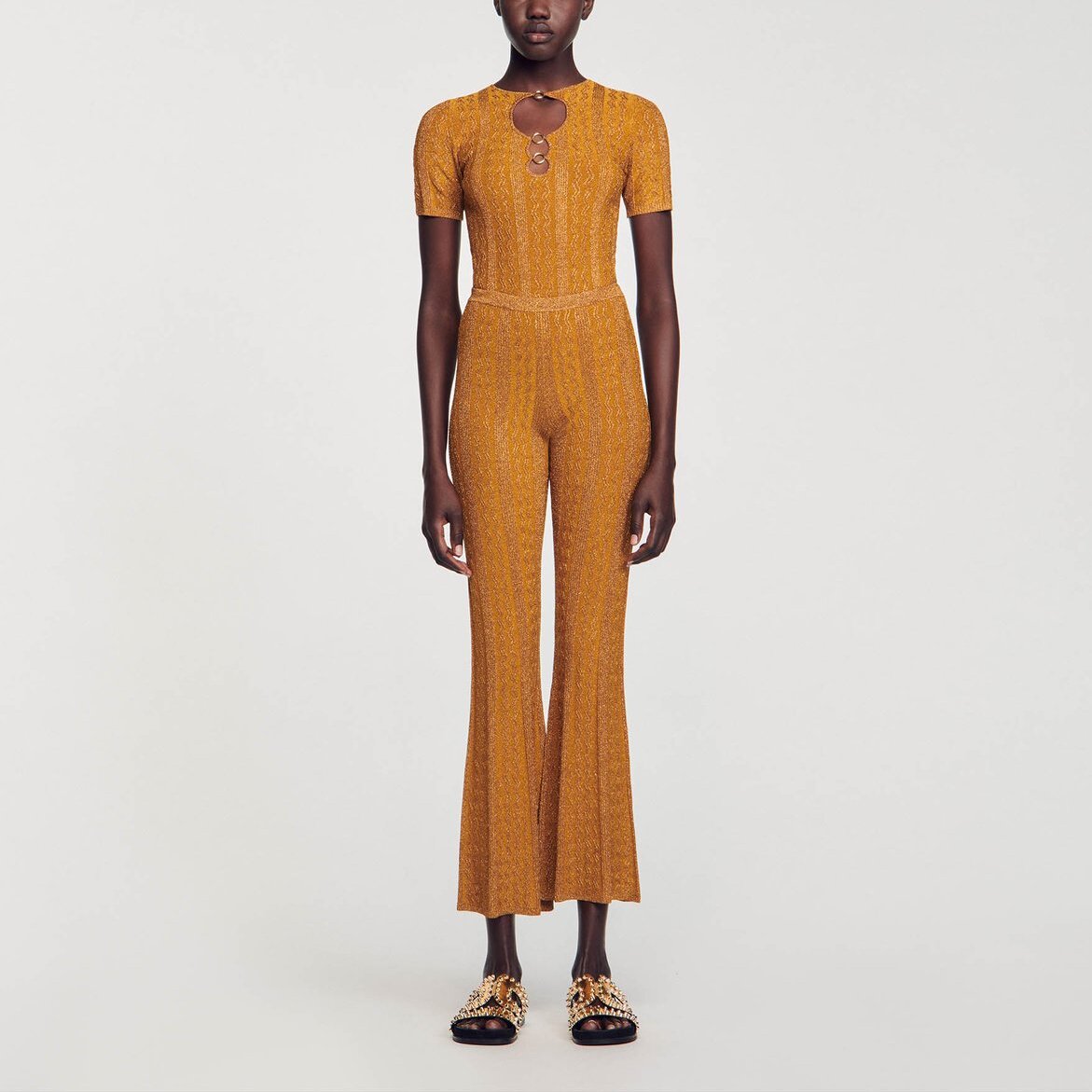 Pantalon en Maille métallisée Sandro seconde main