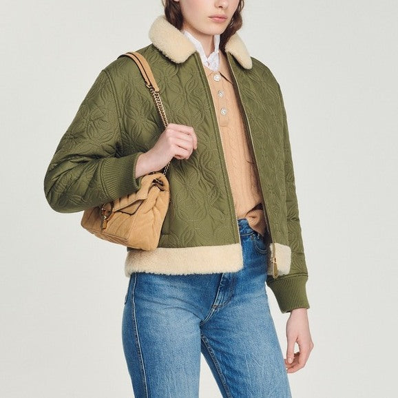 Manteau matelassé à col fourré Sandro seconde main