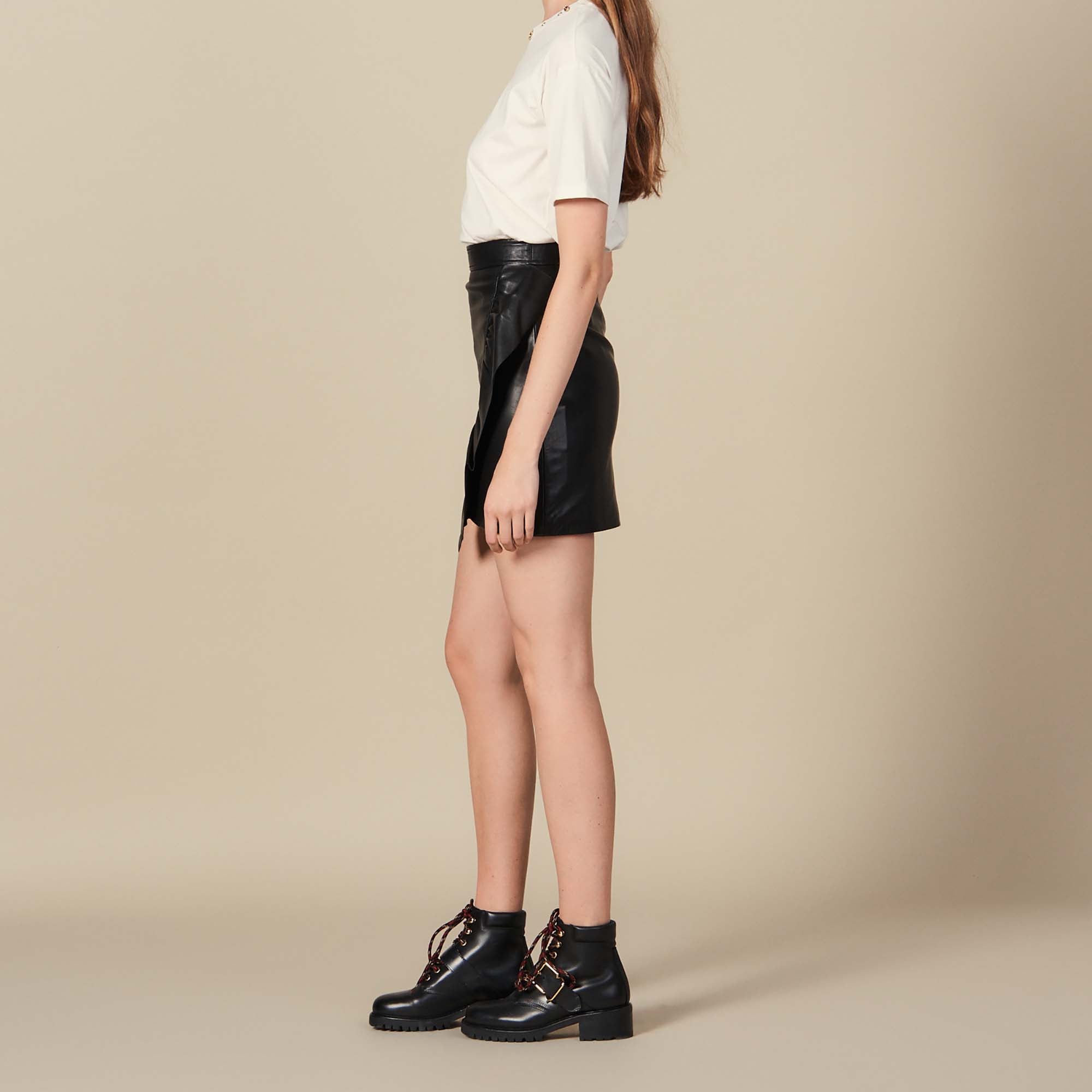 Jupe courte en cuir avec volant Sandro seconde main